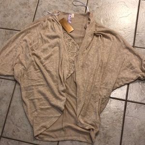 Francesca’s sweater small. Alya